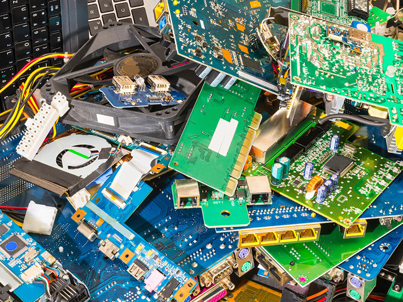 e-Waste computer parts are piled high